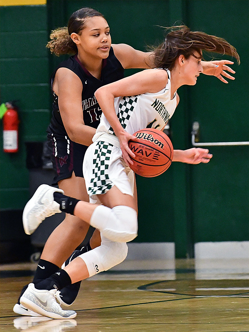 Northwood's Chandler Adams drives to the basket against Wakefield. The Lady Chargers lost the game  57-30.