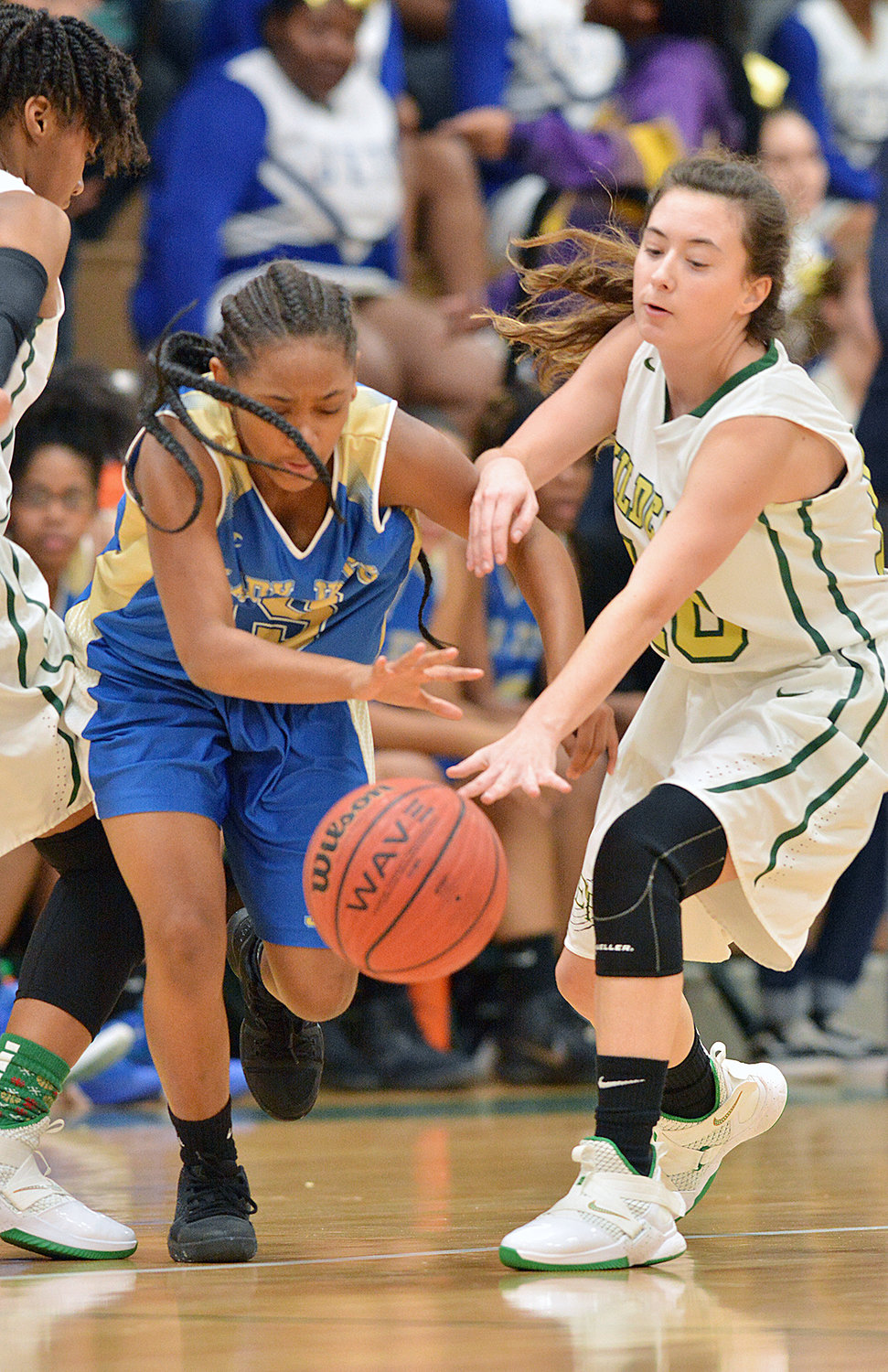 Ellia Wright moves past Wildcat Lilly Whitaker Friday night at Eastern Randolph. The Wildcats won the game.