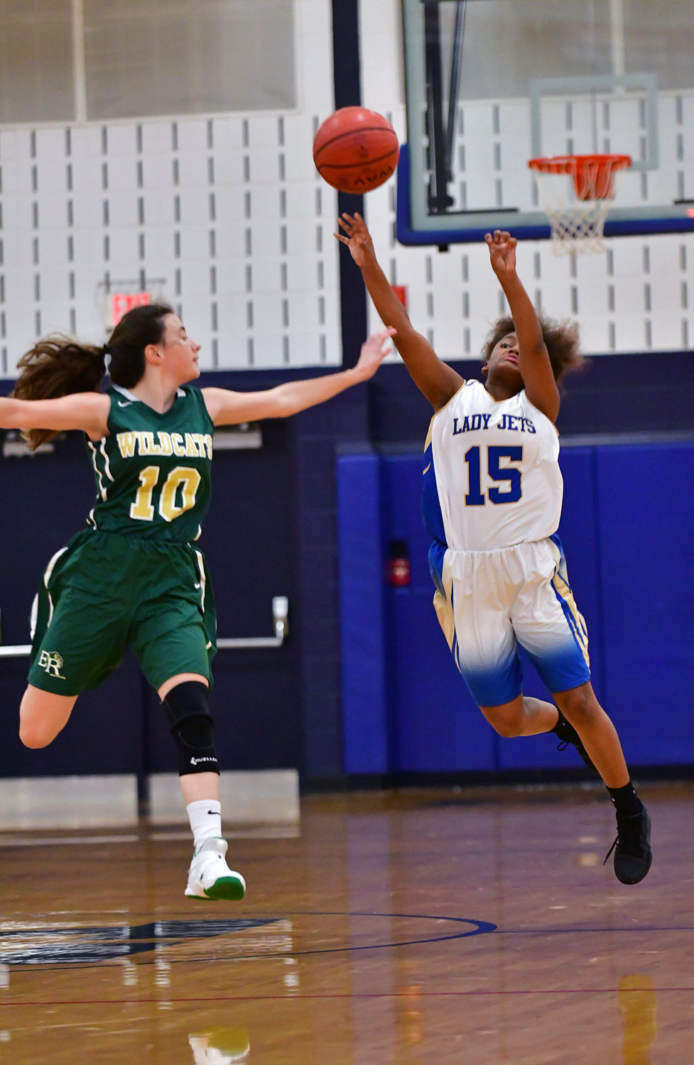 Lady Jet Ellia Wright lets loose with a last second shot at the end of the second quarter in their win over Eastern Randolph.