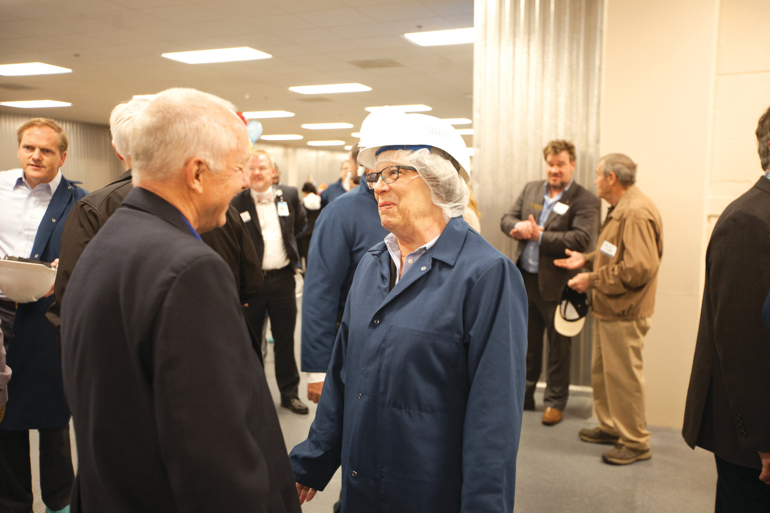 Linda Harris and Bob Kenney shared a few moments during the ribbon cutting at the new Mountaire plant in Siler City on April 16.