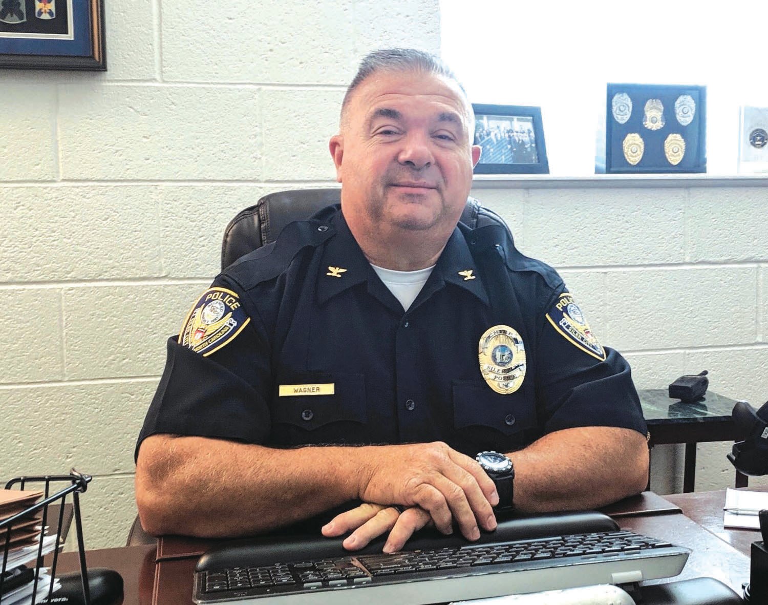 Siler City Chief of Police Mike Wagner sits in his office in Town Hall.