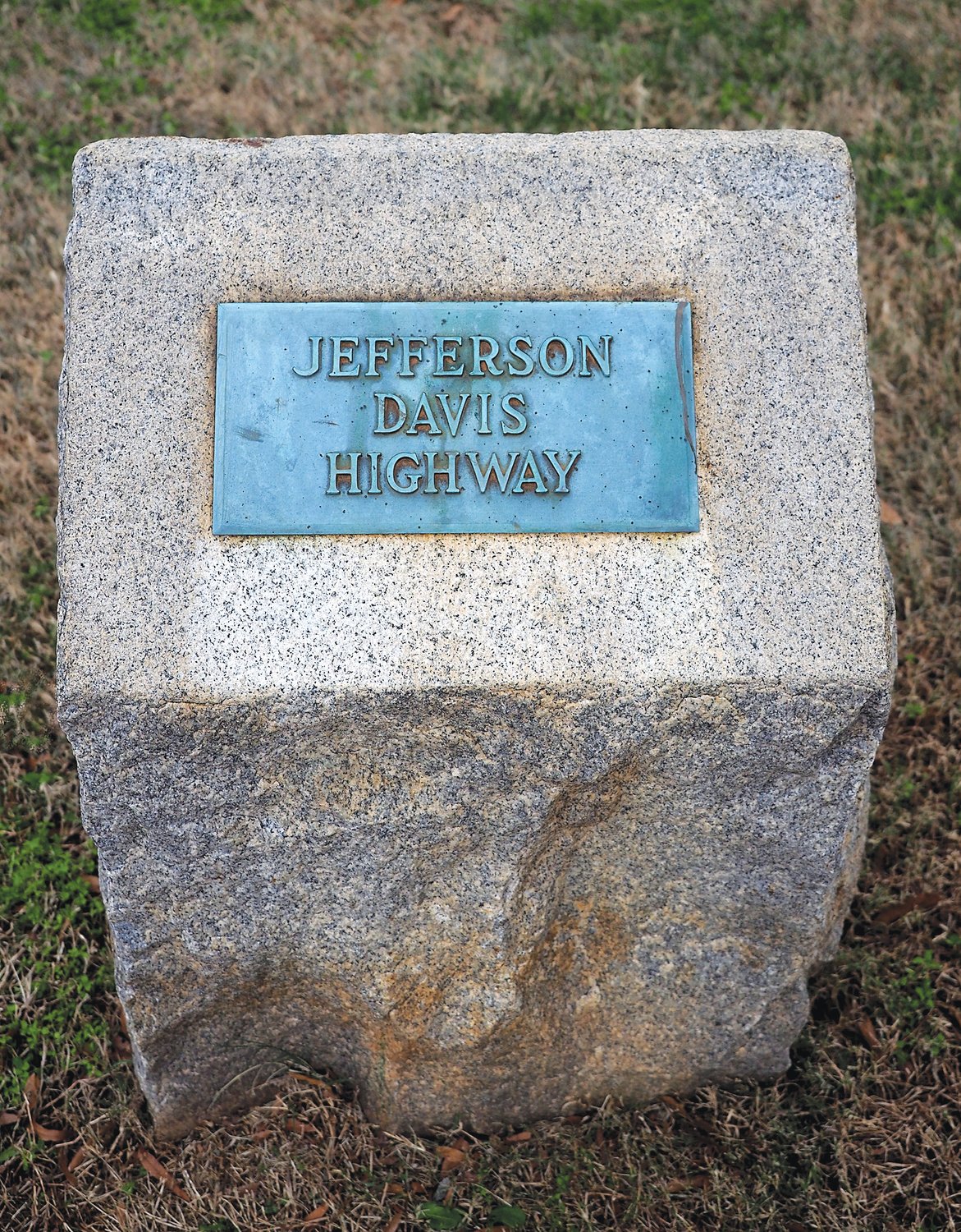 This Jefferson Davis Highway marker, which stands in front of the Chatham County Historic Courthouse, was installed by the United Daughters of the Confederacy in the 1920s. It is one of the eight remaining markers in the state.