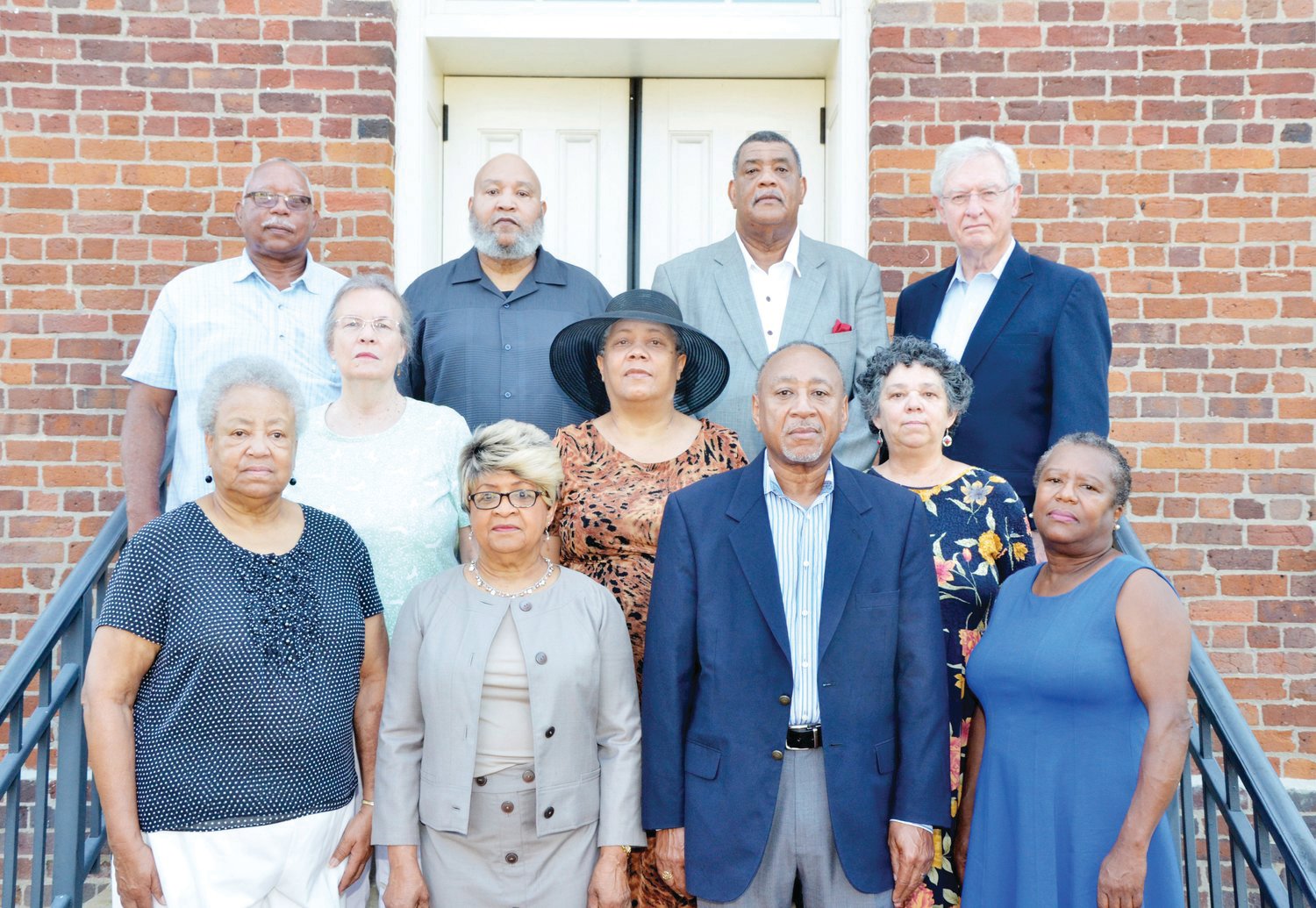 This group was involved in the creation of the Community Remembrance Coalition. Front row, from left: Armentha Davis, Mary Harris, Larry Brooks and Mary Nettles. Middle row, from left: Vickie Shea, Cledia Holland and Linda Batley. Back row, from left: Glenn Fox, Wayne Holland, Carl Thompson and Bob Pearson. Pearson, a retired attorney and diplomat who lives in Fearrington Village, was responsible for getting the effort started.