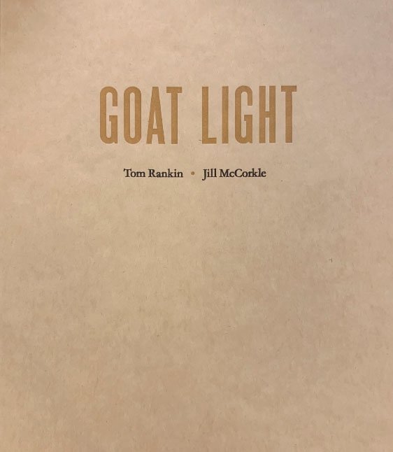 Goat Light is published in two limited editions — an edition of 750 sewn copies, offset printed in full color on 120-pound, uncoated text-weight, bright-white paper, and with covers printed on a hand-fed, hand-cranked letterpress. The heavyweight uncoated cover stock is a mottled color somewhere between that of burlap and a hay bale. A deluxe, limited edition of 26 copies, lettered A–Z, and signed by both Tom and Jill, includes an 8-by-10 inch selenium-toned, gelatin-silver contact print of an image not found in the book.