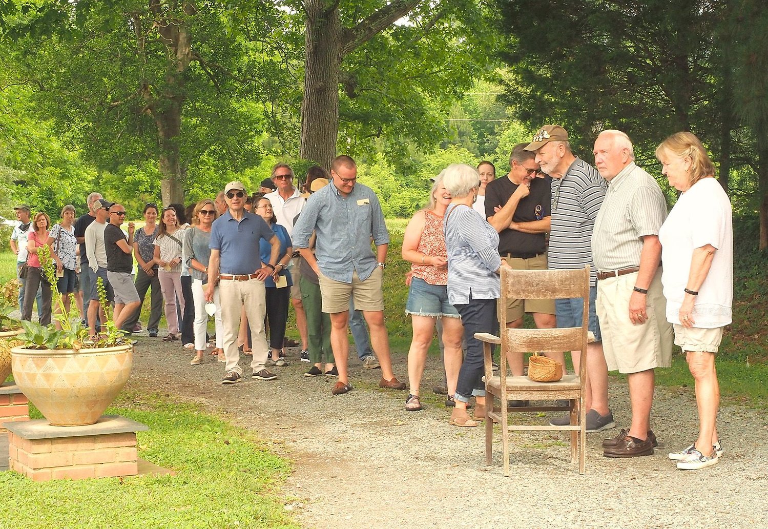 Local pottery Mark Hewitt’s first public kiln opening since the COVID-19 pandemic felt like a homecoming. Here, customers lined up on Johnny Burke Road in Pittsboro over the weekend to view pottery and purchase pieces.