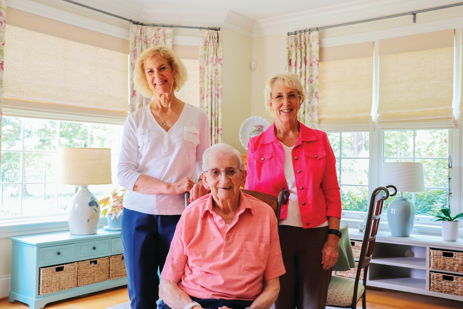 World War II veteran Wesley Hart, who's 102 years old, poses with his daughters Lynne Dyer (left) and Kathy Wakeman at the home he shares with Kathy in Chapel Ridge. Hart will be awarded the French Legion of Honor in a ceremony on Aug. 12.