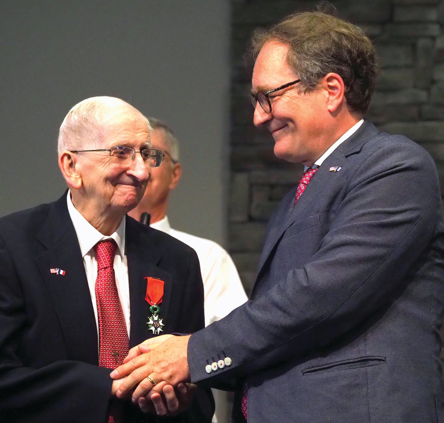 Wesley Hart, a 102-year-old Chatham County resident, is awarded the French Legion of Honor from Vincent Hommeril of the French consulate in Atlanta. Hart's ceremony took place last Thursday at New Salem Church in Pittsboro.