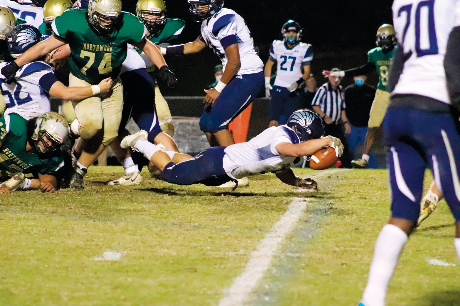 Western Alamance junior running back Mason Hogsed dives into the end zone for a 1-yard TD run in the second quarter of the Chargers' 21-6 loss to the Warriors last Friday. The touchdown came almost immediately after a muffed kickoff return by Northwood.