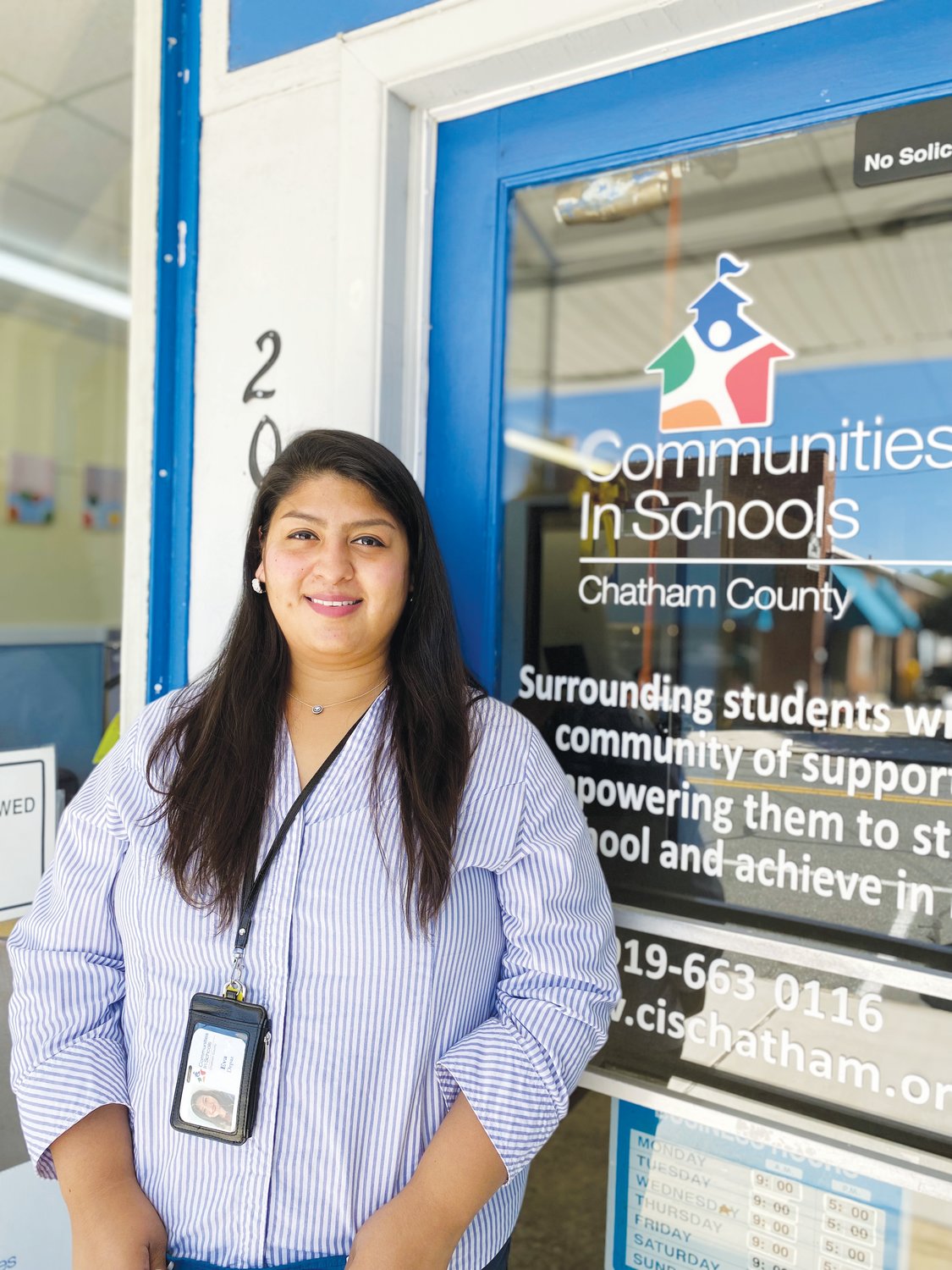 Eva Depaz, a student support specialist at Virginia Cross Elementary School, outside of CIS-Chatham's office in downtown Siler City. She joined CIS in August.