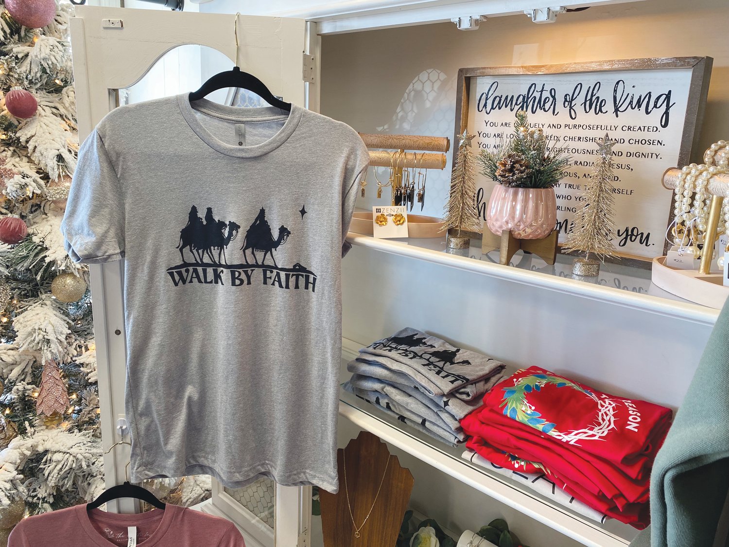 Faithfully Fruitful features women's clothing, accessories and jewelry and more. Some items are adorned with scripture or Biblical themes.