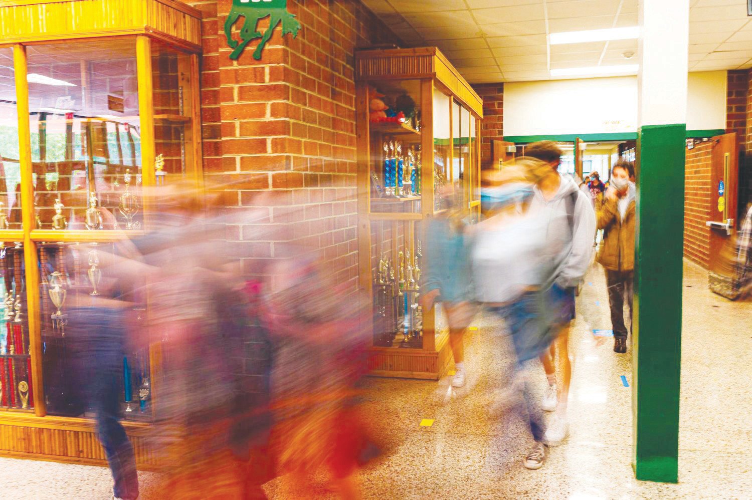 Students change classes in the hallway of Northwood High School last spring. This year, many students are struggling in the middle of a third school year impacted by the pandemic.