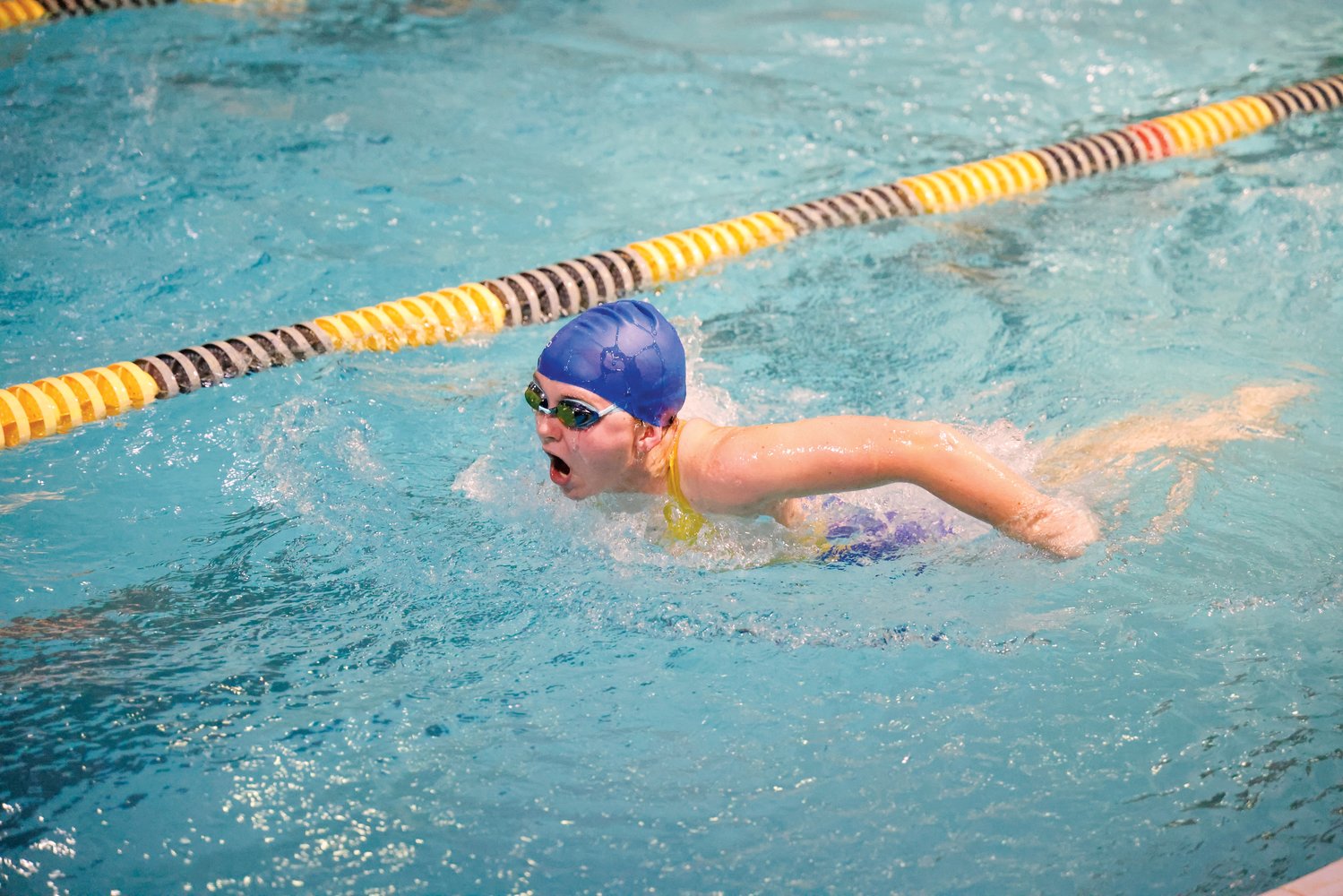 Jordan-Matthews senior Emma Wieber, one of the team's two returning swimmers, races in the women's 100-meter breaststroke at a swim meet in Asheboro last Thursday. She placed 5th in the event with a time of 1:59.01.