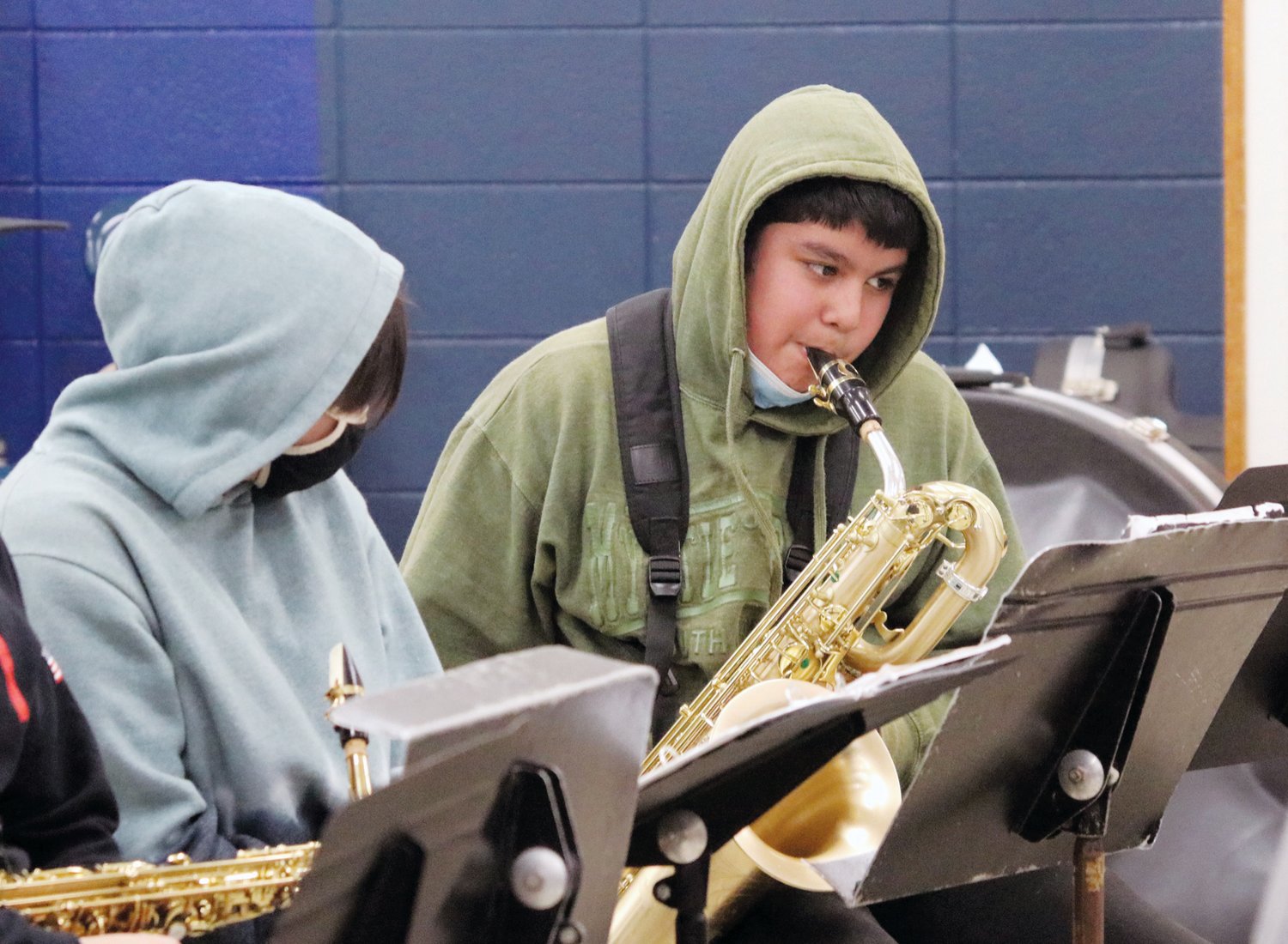 Saxophonist Jonathan Vasquez from Chatham Middle School plays a tune during an afternoon workshop led by La Fiesta Latin Jazz Sextet last Friday inside J-M.