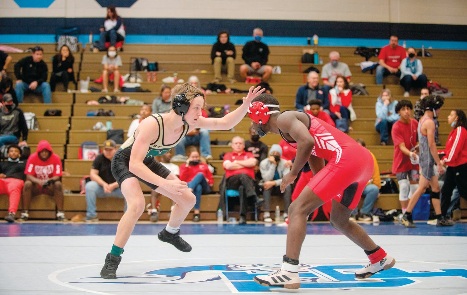 Northwood 120-pounder Coltrane Northington (left) sizes up his opponent, Seventy-First High School's Ramir Hall, during a match in the NCHSAA 3A Mideast Wrestling Regionals last Saturday at Union Pines High School.