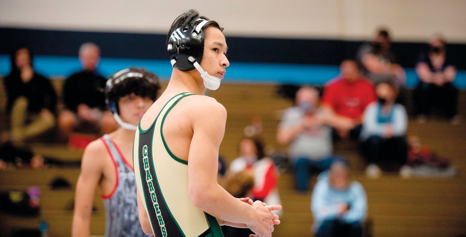 Northwood 113-pounder Sunday Oo surveys the crowd before a match in the NCHSAA 3A Mideast Wrestling Regionals at Union Pines High School last Saturday.