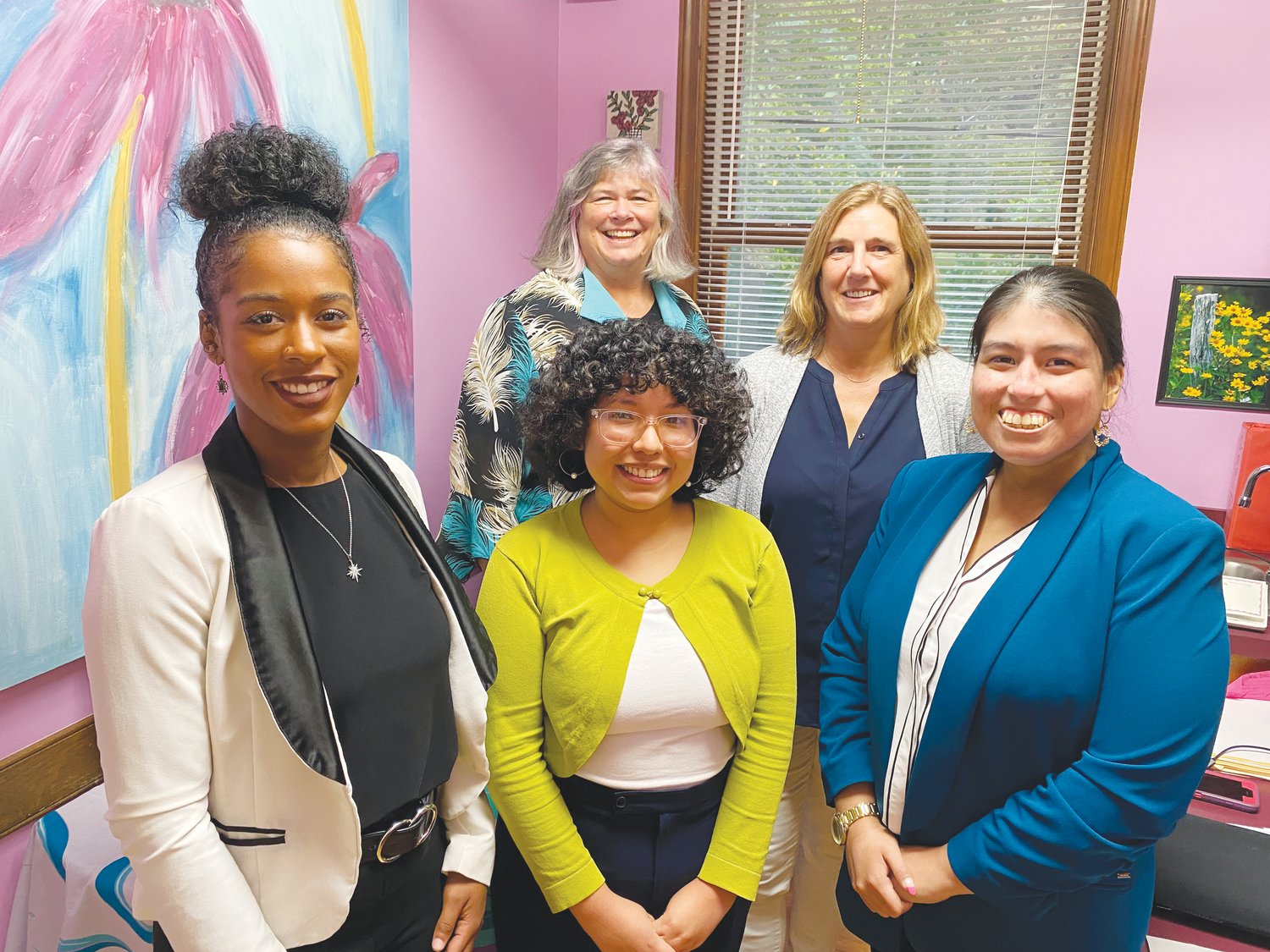Chatham Literacy's Executive Director, Vicki Newell (in back), poses with staff members, from left, Kayla McCline, Joselyn Villasenor, D.J. Lynch and Leslie Ocampo.