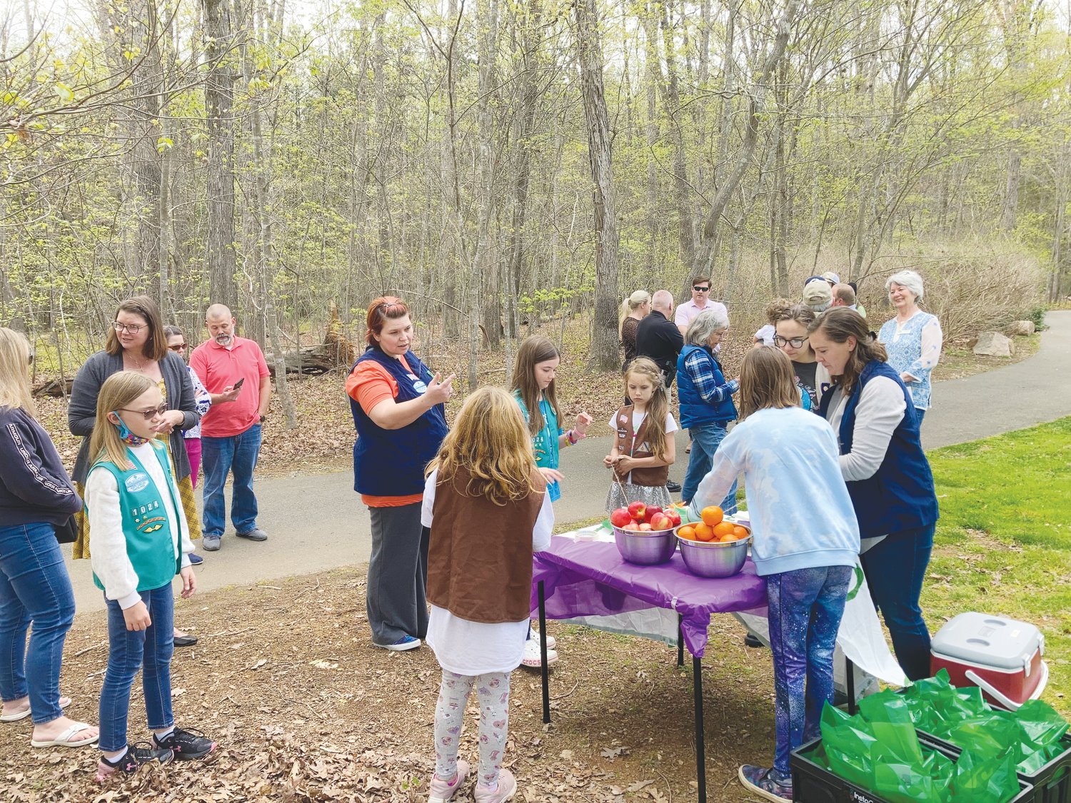 Members of Girl Scout Troop 1024 set up a table of snacks for the Pittsboro Arbor Day event.