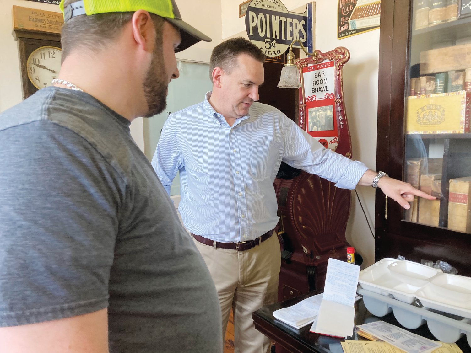 S&T's Soda Shoppe co-owner T.J. Oldham gives a tour of the historic restaurant to Congressman Richard Hudson Jr. during Hudson's campaign visit in Pittsboro.