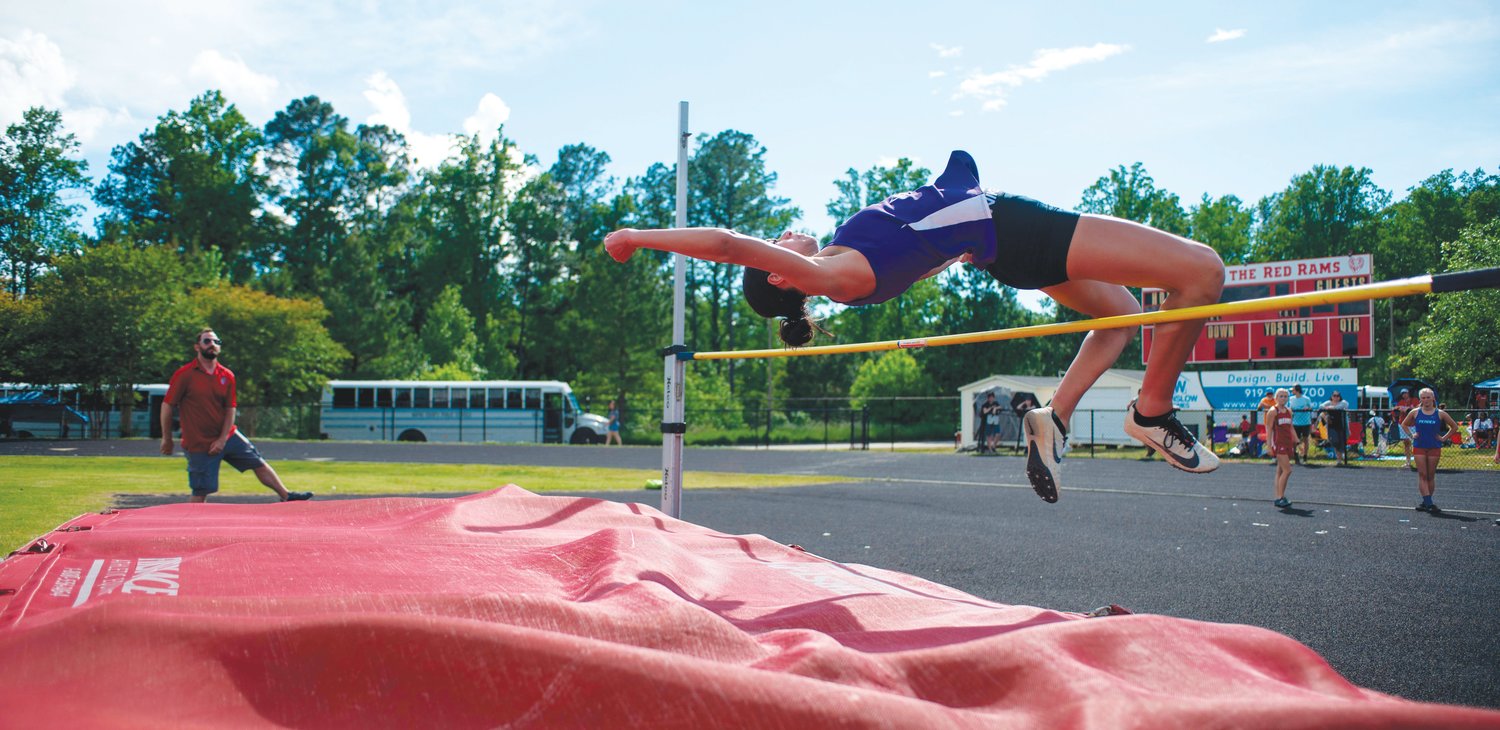 Chatham Charter senior Brooke Garner attempts to clear the bar during.the women's high jump event during the NCHSAA 1A Mideast Regionals on Saturday at Franklinton High School. Garner placed sixth in the event, but qualified for states in both the women's long jump and triple jump.