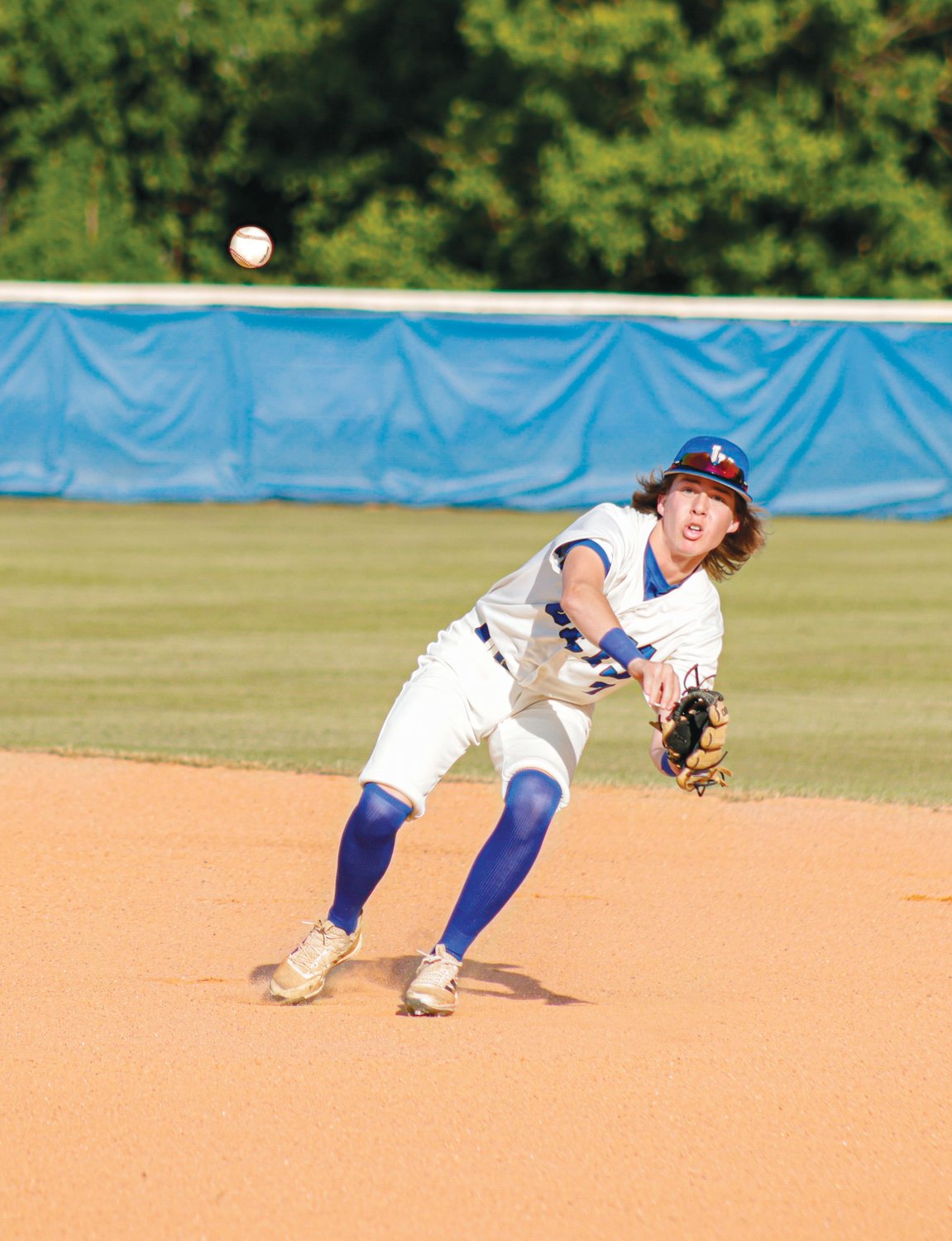 Jordan-Matthews junior shortstop Jackson Headen throws the ball toward first base in an attempt to get a runner out in the Jets' 3-1 first-round playoff victory over the Southwest Edgecombe Cougars on May 10.