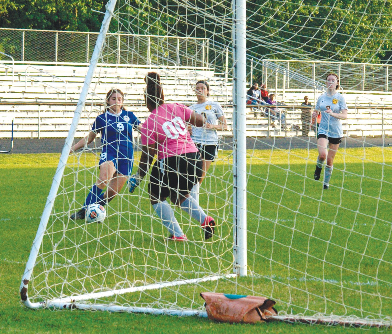 Jordan-Matthews sophomore Iris Sibrian Zetino (9) dribbles around the James Kenan goalkeeper in the Jets' 9-0 blowout win over the Tigers on Monday. Sibrian Zetino scored 2 goals in the victory, good for the game's second-highest scorer.
