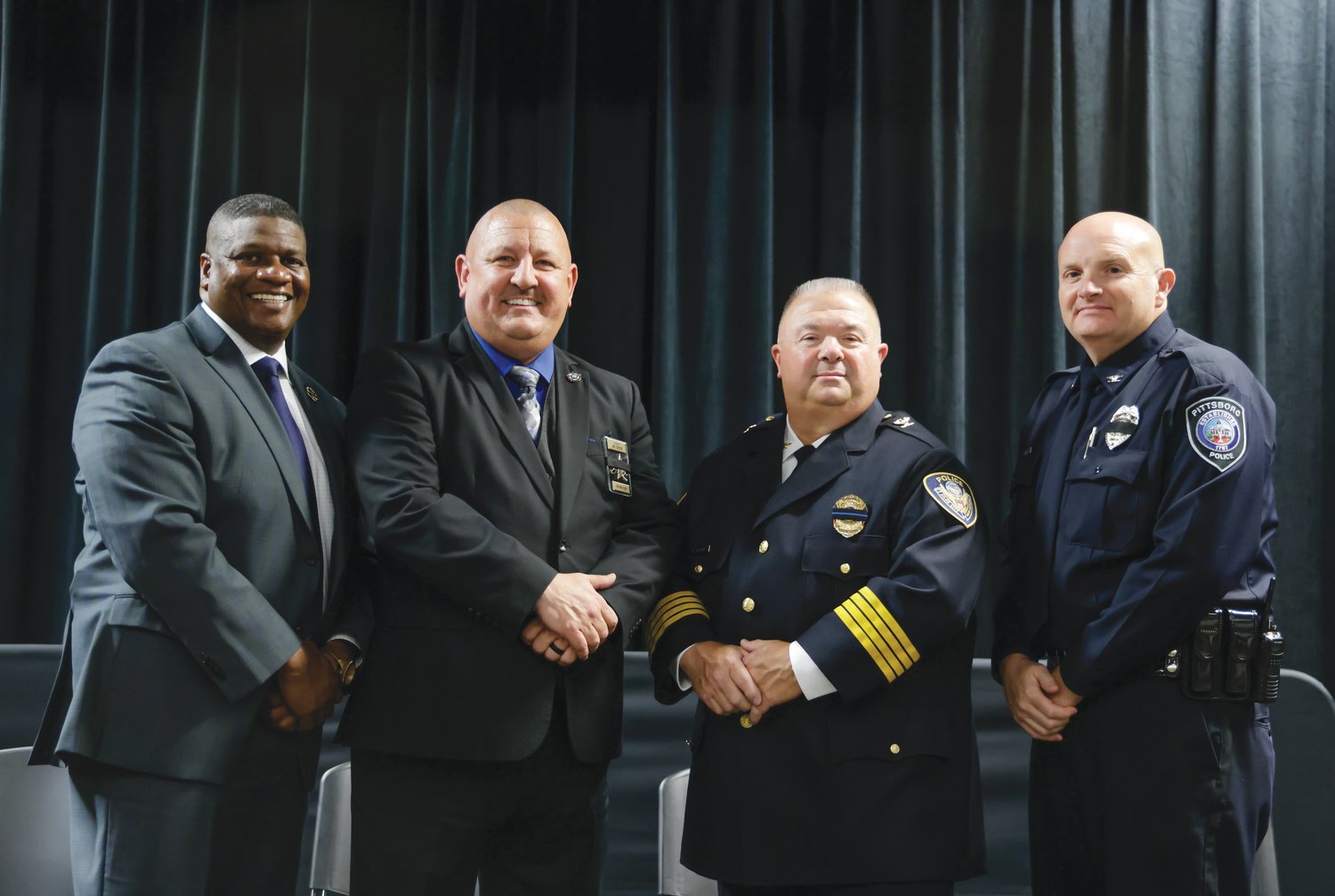 Law enforcement officers at last week's Police Week event included, from left, Edgecombe County Sheriff Cleveland Atkinson, Chatham County Sheriff Mike Roberson, Siler City Police Chief Mike Wagner and Pittsboro Police Chief Shorty Johnson.