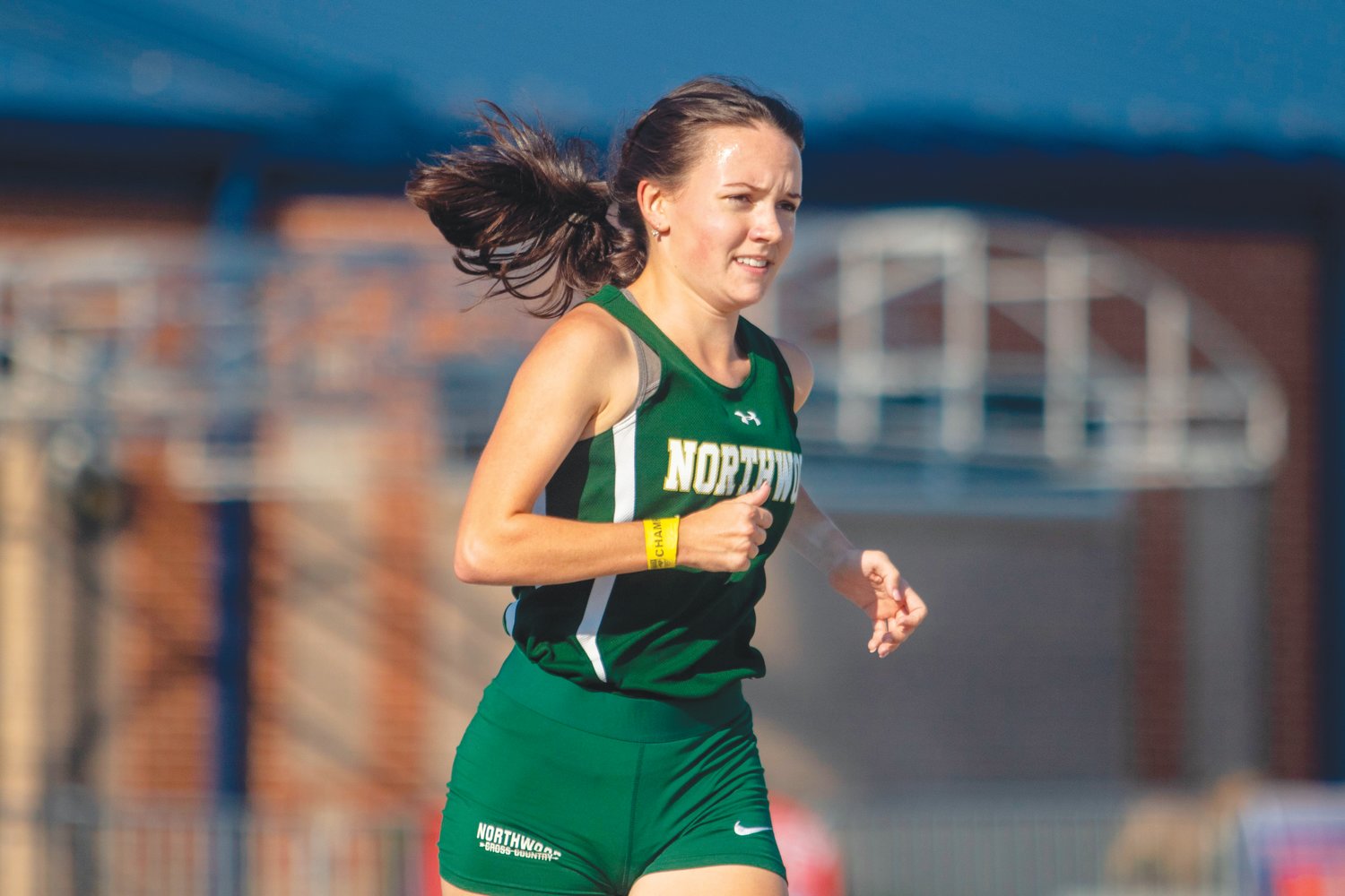Northwood senior distance runner Caroline Murrell strides down the track in one of her two state-title-winning races at the 2022 NCHSAA 3A Track & Field State Championships last Friday in Greensboro. Murrell took first place in both the women's 1,600- and 3,200-meter runs, amounting to four state titles in the last 12 months.