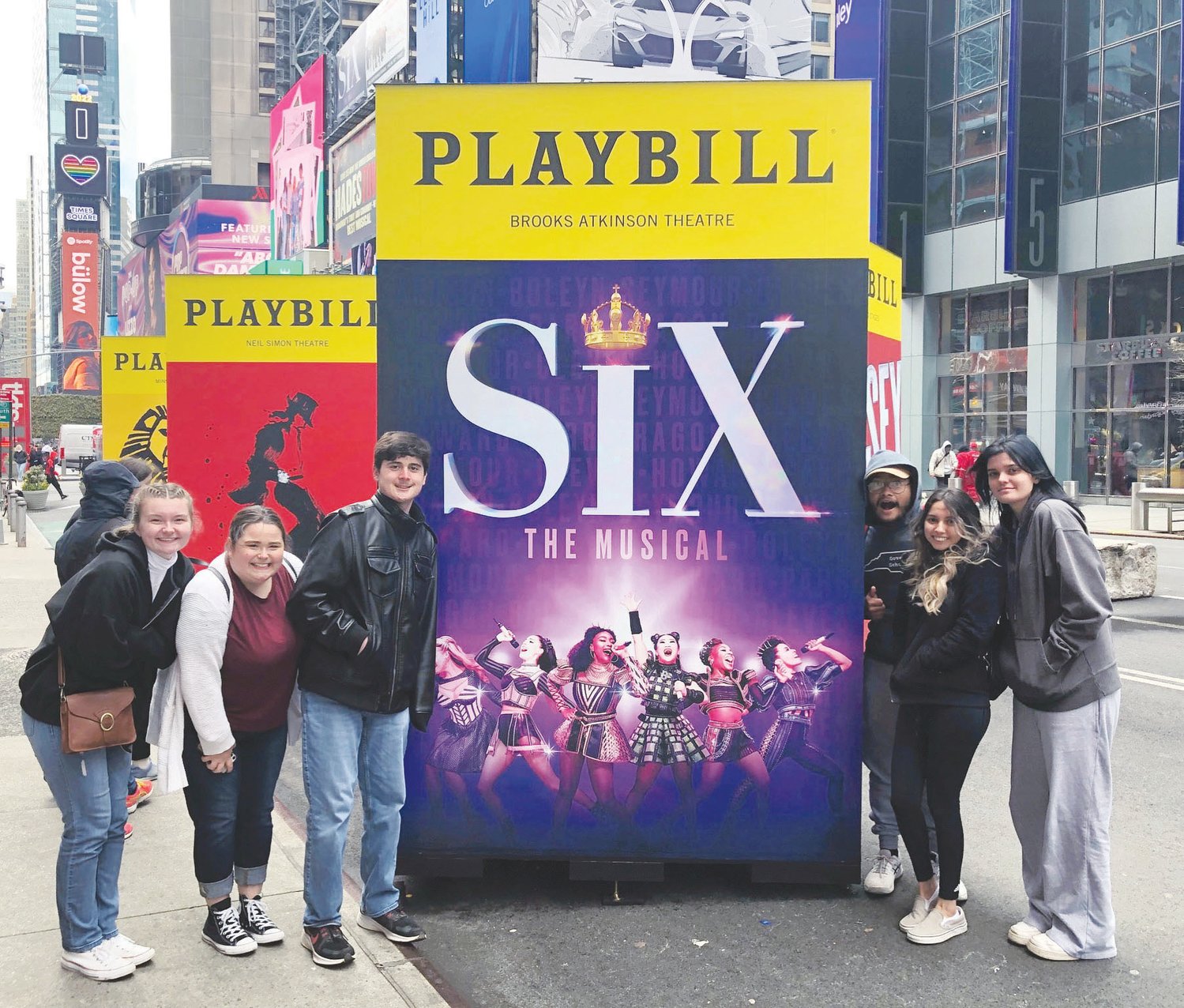 J-M students find the giant 'Six' Playbill at a special Times Square exhibit a few days before seeing the musical.