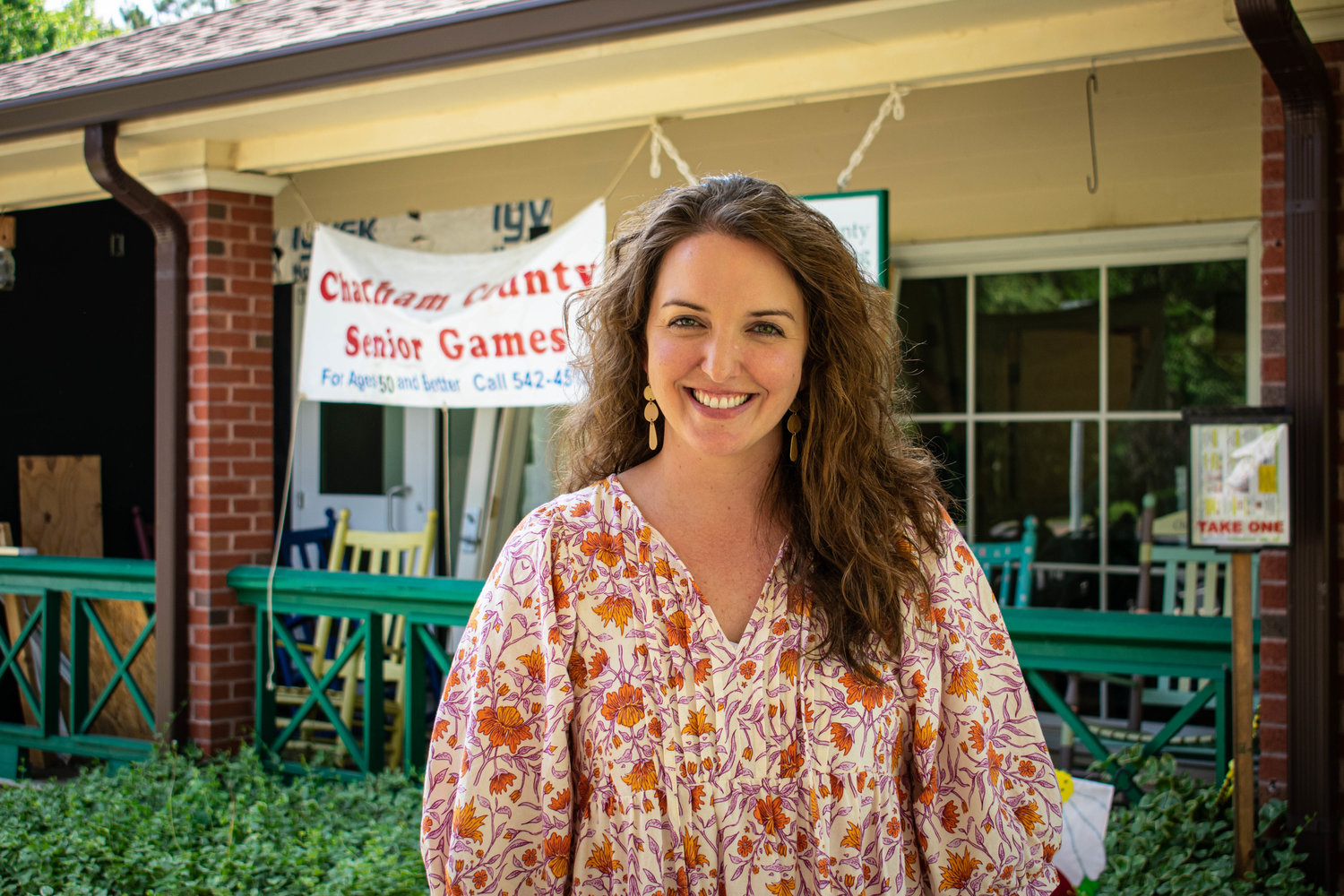 New COA executive director Ashlyn Martin in front of the Eastern Chatham Senior Center.