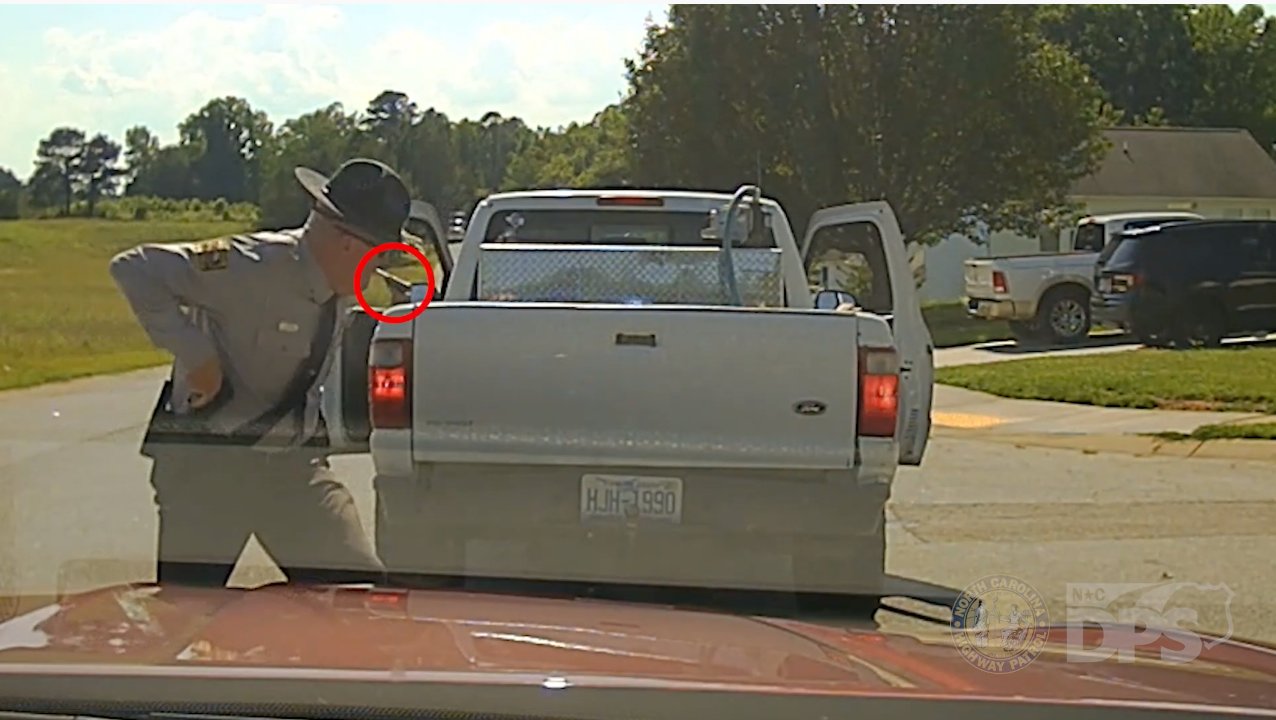 A screenshot of dashcam footage from North Carolina Highway Patrol. On June 7, 2022, released dash camera video of the fatal shooting of Mark Anthony Diaz by Trooper Rodney Cook during a traffic stop in Siler City on Memorial Day. This video has been edited by SHP