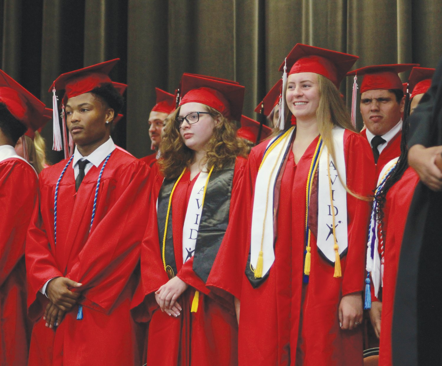 Seniors of the Chatham Central High School graduating class of 2022 make their way on stage to their seats before graduation on Friday at the Dennis A. Wicker Civic Center in Sanford.