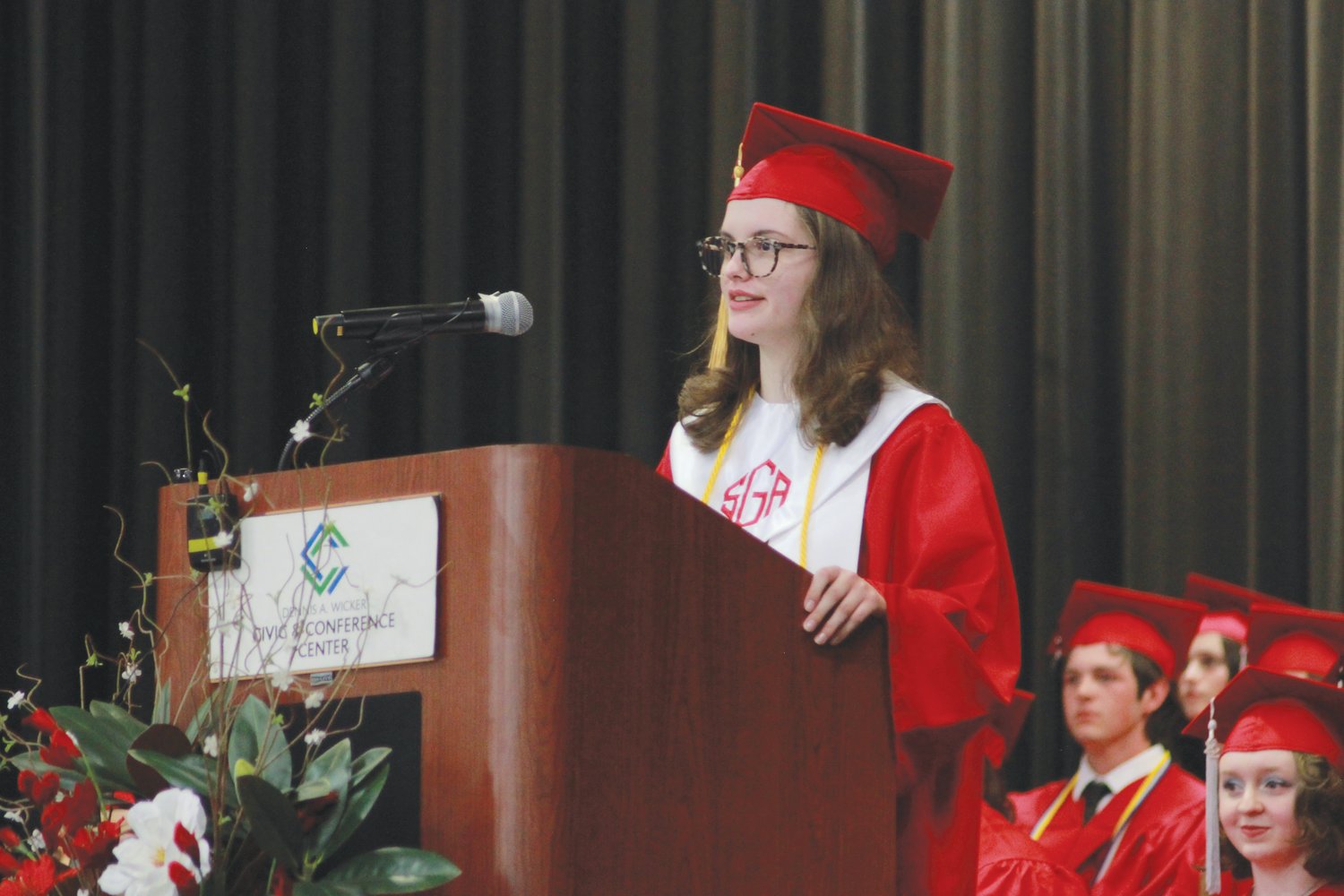 Chatham Central High School Senior Ella Gaines gives her expression of gratitude speech to her graduating class on Friday at the Dennis A. Wicker Civic Center in Sanford.