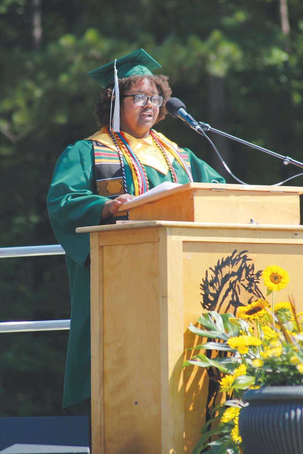 Nothwood senior Kennedy Poston reads her final reflection speech to her fellow classmates during graduation on Friday at Northwood High School in Pittsboro.