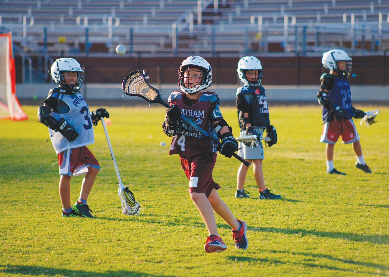 Camper Thomas Greto (center) works on passing during Seaforth's first-ever youth lacrosse camp last Thursday. The 4-day camp featured nearly 60 participants that performed drills, learned fundamentals and played games on the field at Seaforth High School.