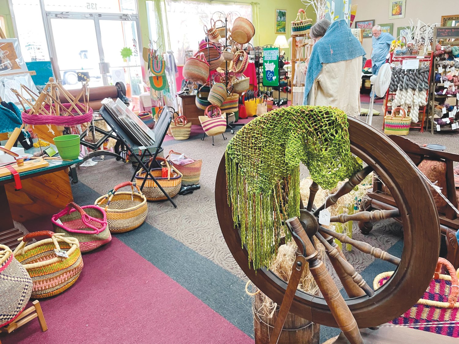 Hand-crafted goods and tools such as baskets and yarn lay on display at Twin Birch & Teasel on Monday in Siler City. The shop in downtown Siler City has specialized in making birchwood fiber art tools since 1982.