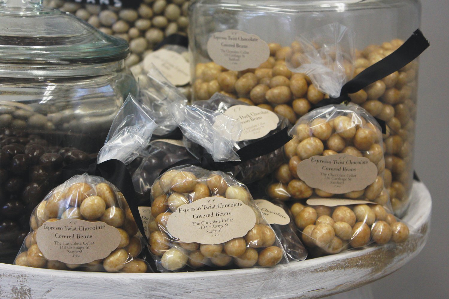 Dark chocolate and esspreso twist chocolate covered beans are among the treats made by, and for sale at, Chocolate Cellar Deux in downtown Pittsboro. The shop occasionally puts out seasonal specials, such as July’s firecracker truffle, made with pop rocks.
