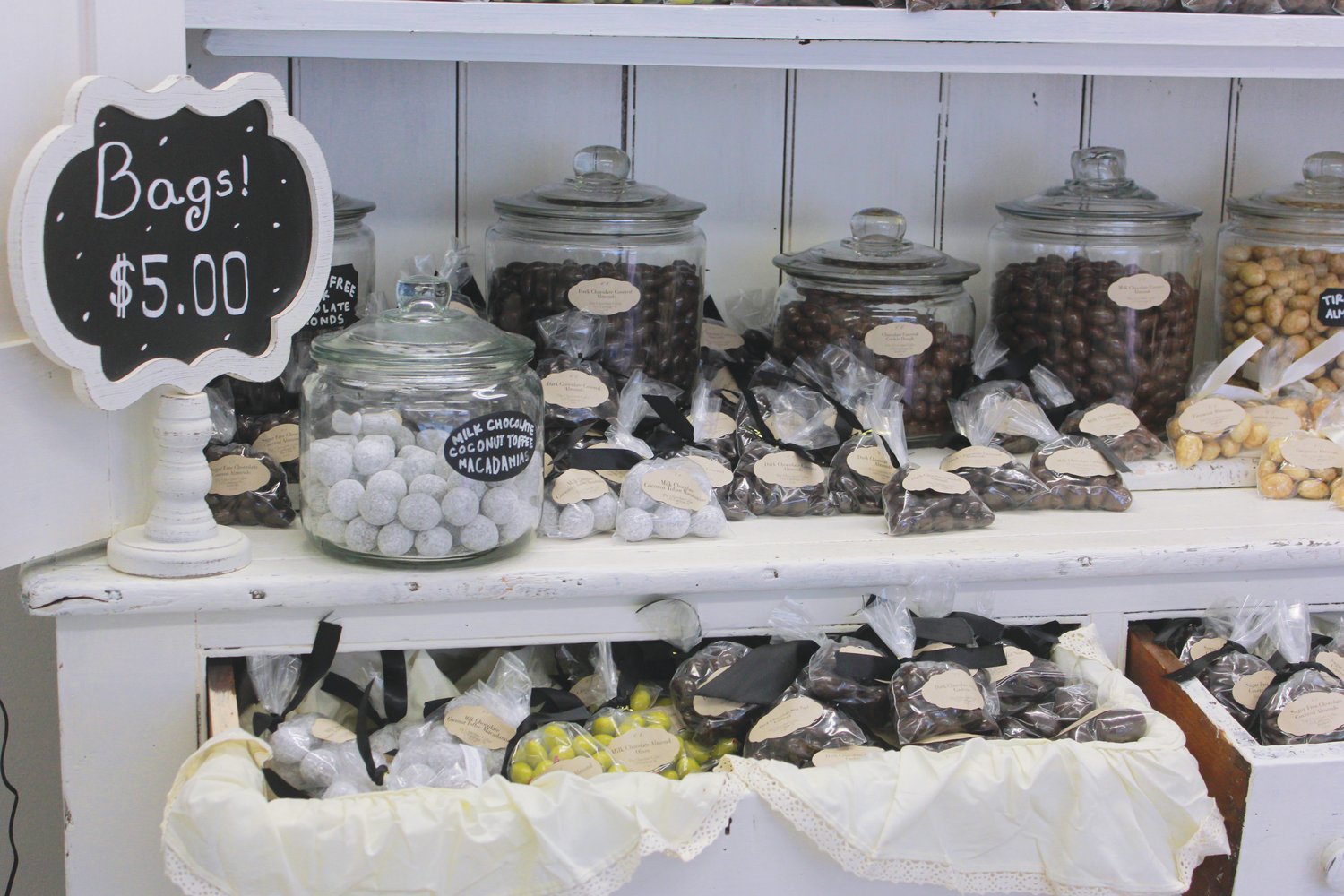 Shelves are filled with a variety of candies availible for purchase at the Chocolate Cellar Deux. This sweets store, which opened its doors in Pittsboro in June, is the sister location to the original Cocolate Cellar located in Sanford.