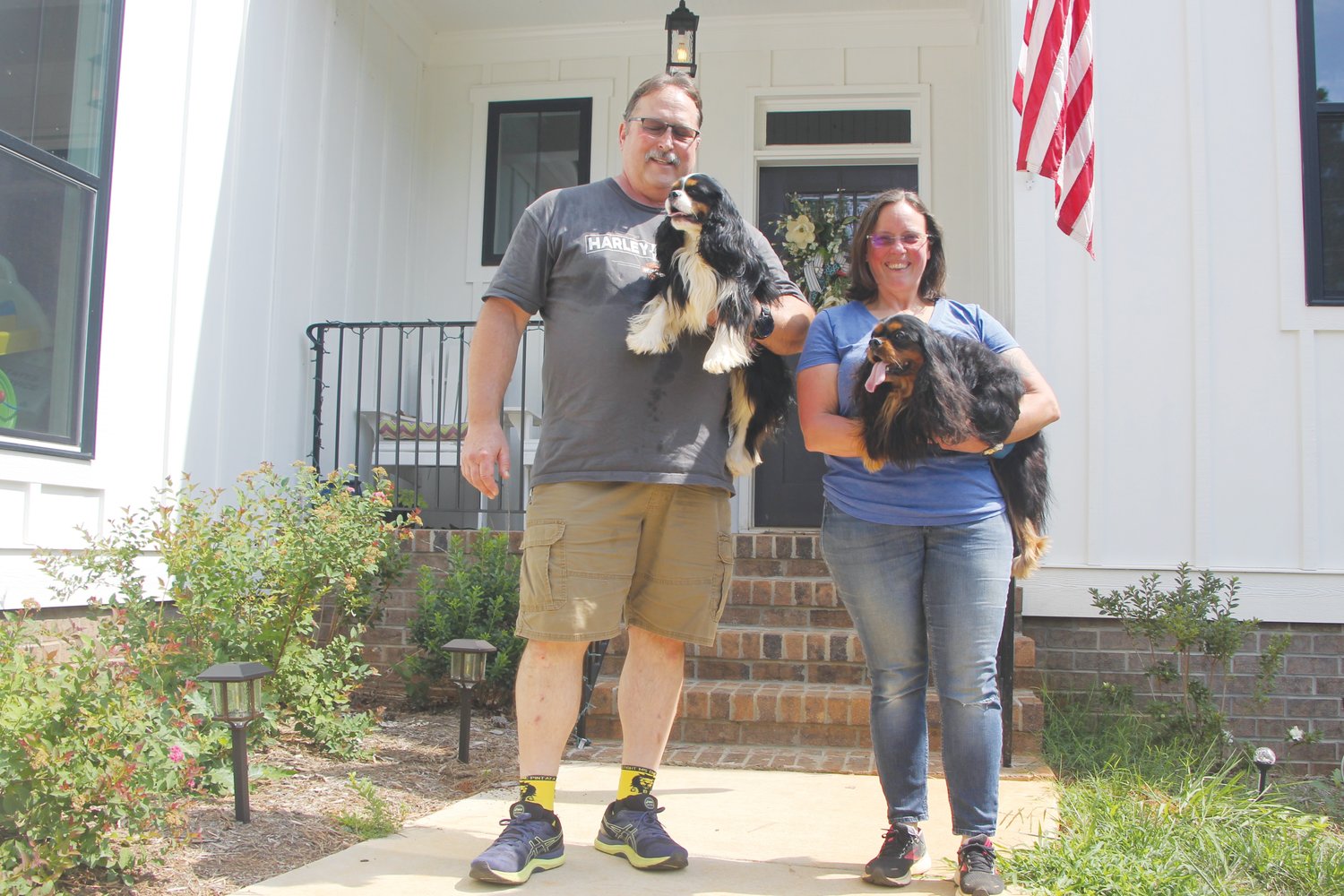 After months of navigating the competitive housing market in the Triangle, Mike Beasley and Beci Markijohn Beasley of Apex found just what they were looking for in Pittsboro — a spacious home and yard, and a dog-friendly neighborhood for their business, Kymerite Cavaliers.