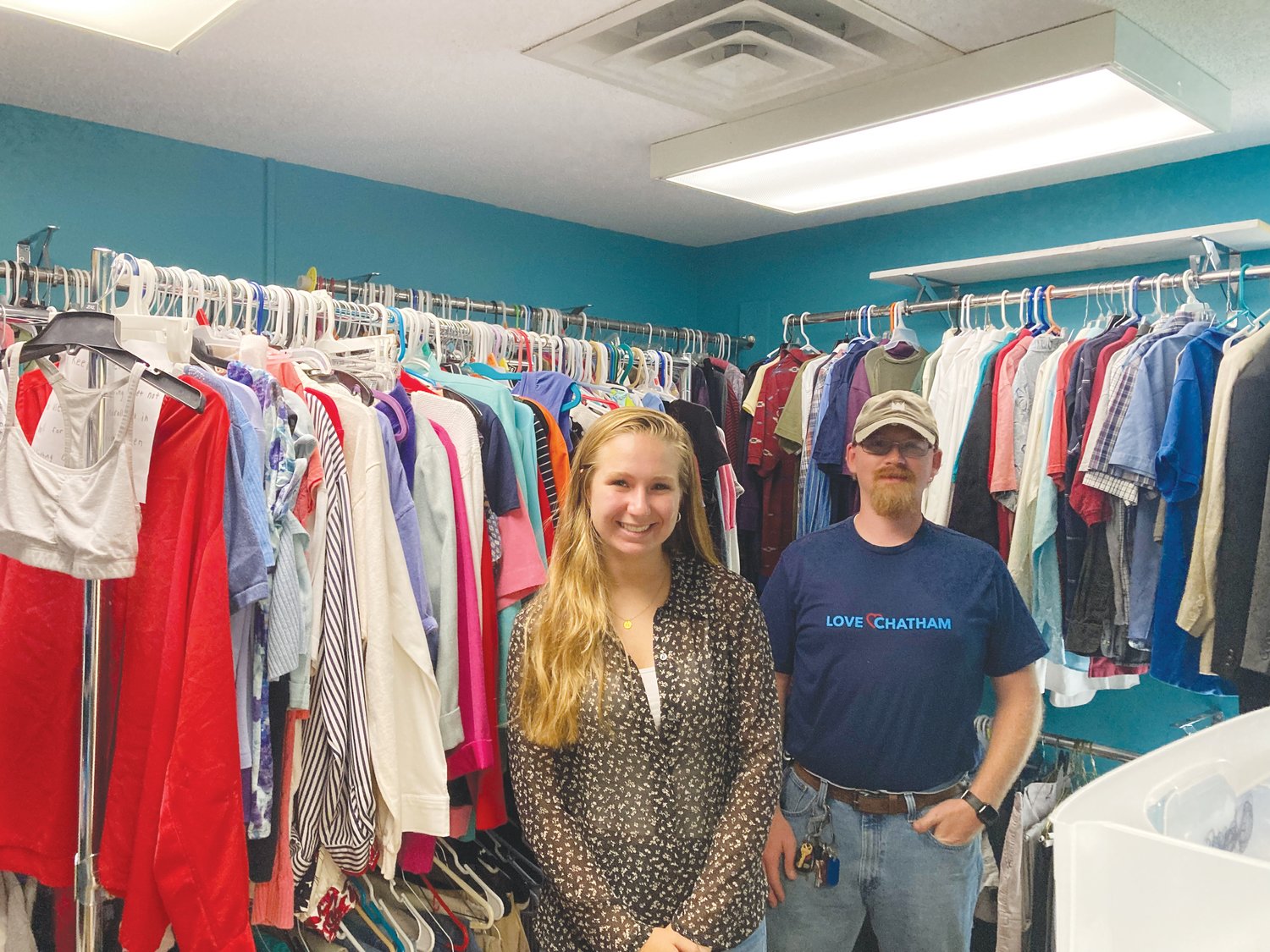 Love Chatham's clothing ministry allows for those in need to come and get clothing items they might lack. Pictured are Mary Lacey Eubanks, Love Chatham's summer intern, and Executive Director Dakota Philbrick.