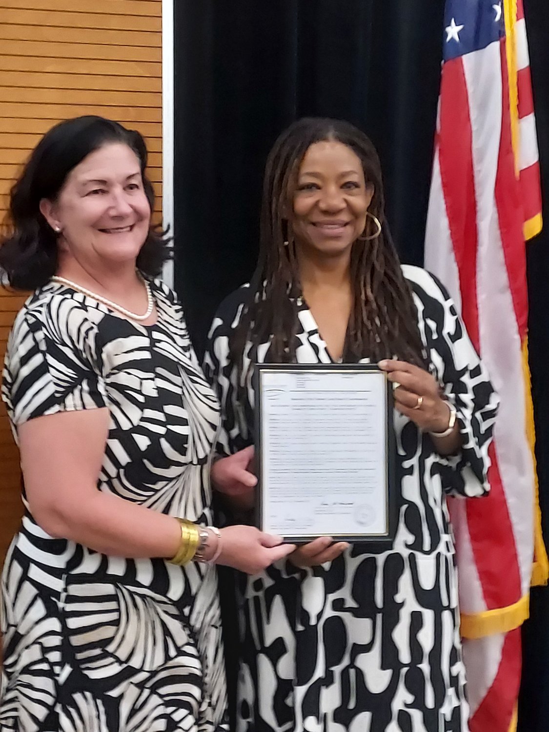 The Chatham County Board of Commissioners unanimously passed a resolution recently recognizing October as National Disability Employment Awareness Month and commemorating its 77th anniversary. The resolution was presented to Chatham Trades Director Shawn Poe (left) by Commission Chairperson Karen Howard.